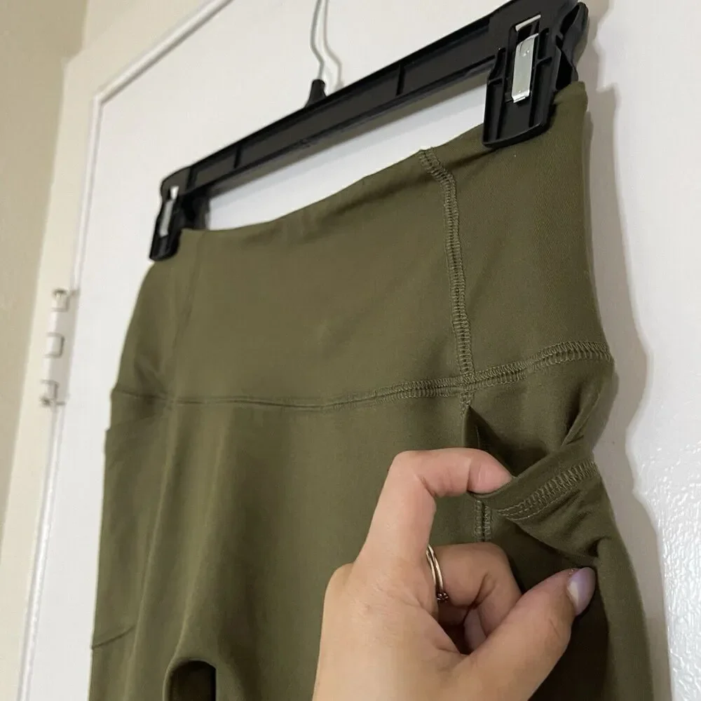FP movement free people green high waist side pockets leggings size small